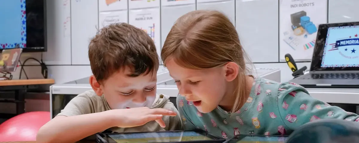 Kids explore YouTube Channels during a STEM education lesson.