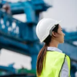 A female civil engineer works to design a safe bridge.