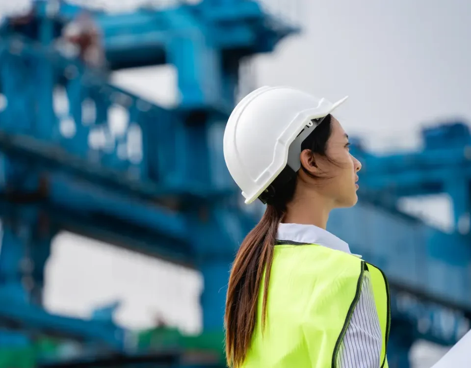 A female civil engineer works to design a safe bridge.