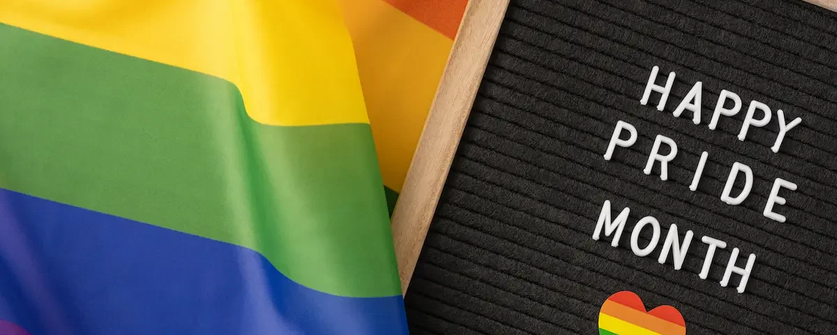 A rainbow flag represents Pride Month.