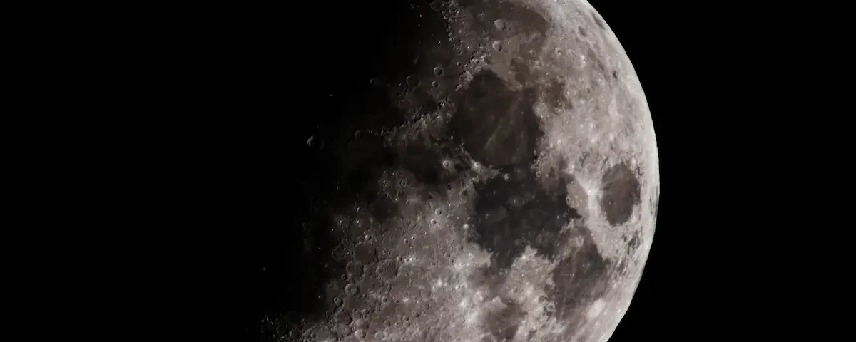 The moon rests against a black background.