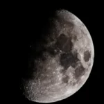 The moon rests against a black background.