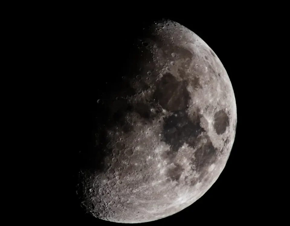 The moon rests against a black background.