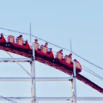 A roller coaster whirs by on National Roller Coaster Day.