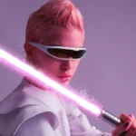 Futuristic, sci-fi woman yielding a lightsaber.