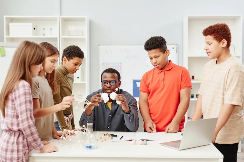 Students working together on a science project in a STEM classroom.