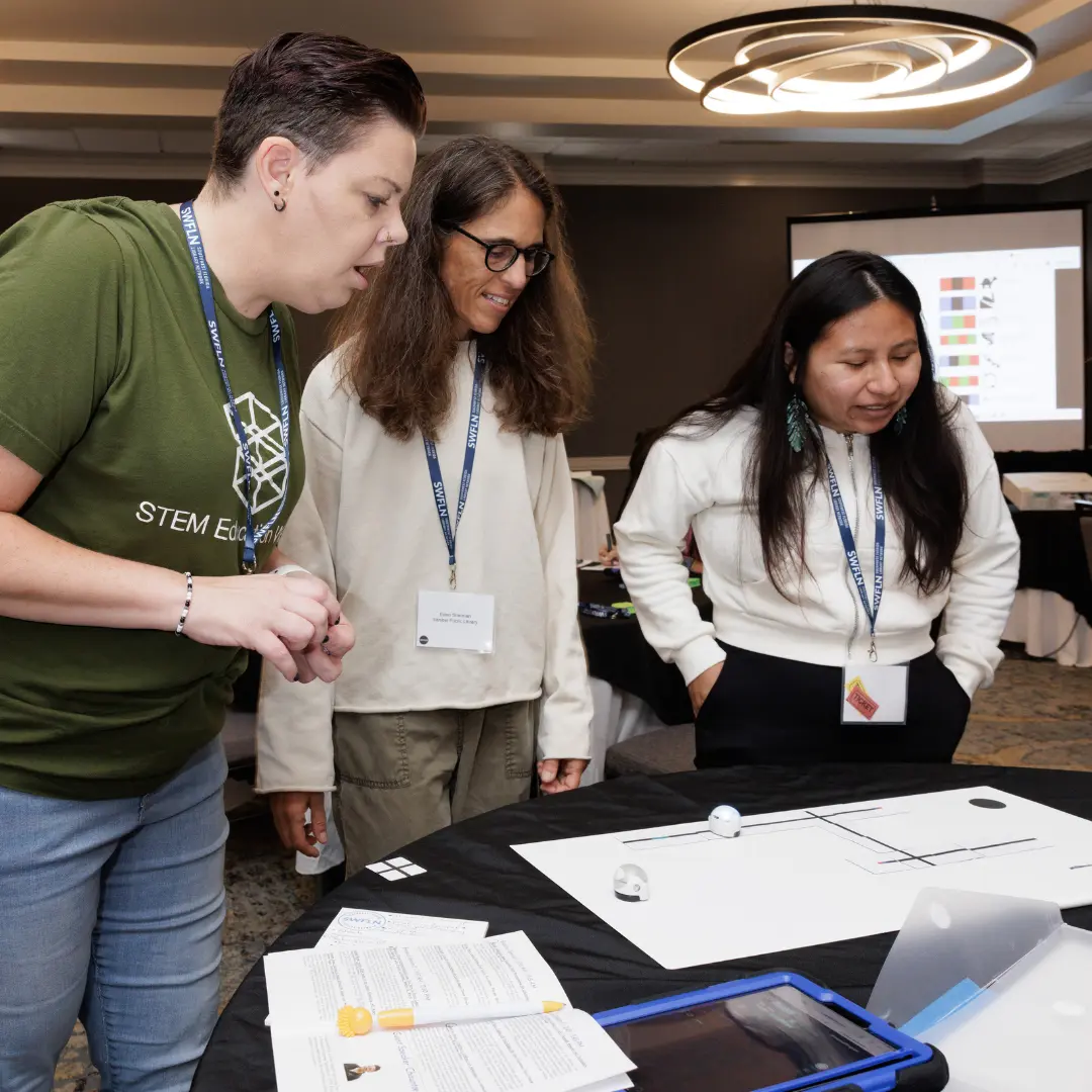 STEM Education Works staff leading Ozobot training for educators and librarians at the Makerpalooza STEM Program training event hosted by Southwest Florida Library Network.