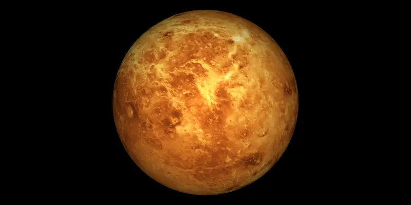 An artist rendering of the planet Venus, a yellow planet in front of a black background.